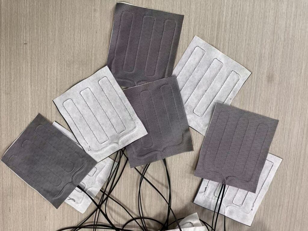 Composite Fiber heated apparel liners